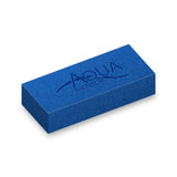 Blue Aquamentor foam training block, 7 by 3 by 1.5 inches, with debossed Aquamentor logo on the top face