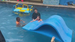Foam pool waterslide in the water at a swim school